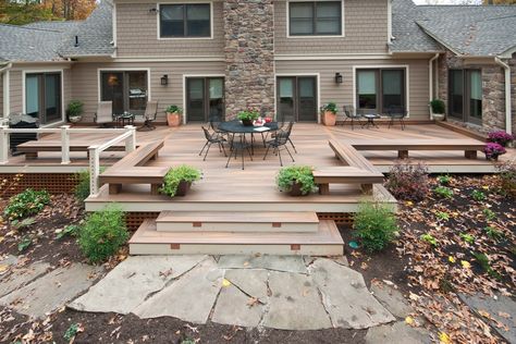 This Ground level deck has a symmetrical look with on one side a railing and and both sides benches wrap around the perimter. Ground Level Deck, Backyard Patio Deck, Amazing Backyard, Backyard House, Patio Deck Designs, House Backyard, Cozy Backyard, Deck Designs Backyard, Decks Backyard