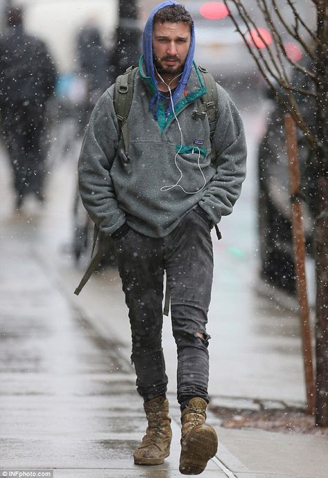 With snow settling on his hair, the celebrity layered up in a thick grey fleece over a blu... Shia Labeouf Style, Stylish Picture, Rat Tail, Jonathan Rhys Meyers, Shia Labeouf, Eyebrow Ring, Army Boots, Phoebe Tonkin, Bradley Cooper