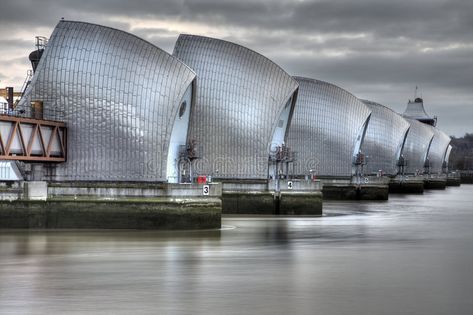 Thames Barrier. View of the Thames Barrier, showing six of the nine concrete pie , #SPONSORED, #showing, #concrete, #piers, #Thames, #Barrier #ad Thames River Cruise, Thames Barrier, Flood Barrier, Gateway Arch, London Attractions, Famous Architects, Exterior Cladding, London Town, Steel Buildings