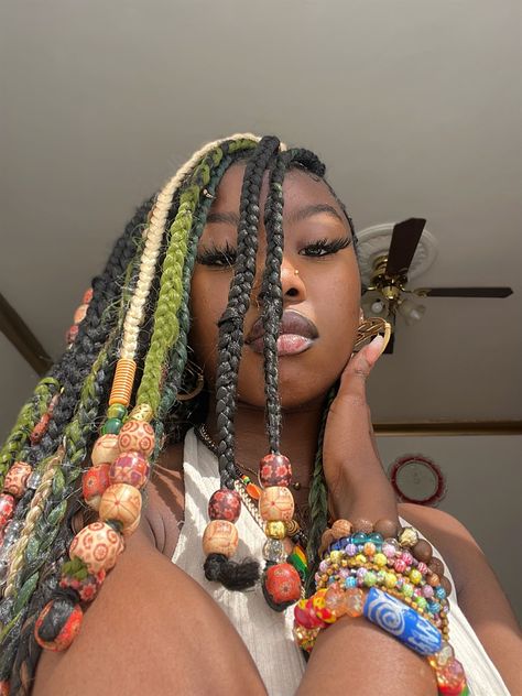 Brown And Green Knotless Braids, Beads For Braids, Green Knotless, Green And White Braids, Braids Green, Green Braids With Beads, Beads In Braids, Blonde And Green Hair Black Women, Earthy Braids