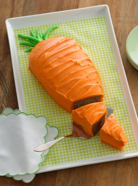 Take this carrot cake a step further by garnishing with chocolate cookie crumbs to resemble dirt! Carrot Cake Shaped Like A Carrot, Carrot Cakes, Shaped Cake, Cake Shapes, Carrot Cake Recipe, Cookie Crumbs, Easter Dessert, Baking Cupcakes, Easter Cakes