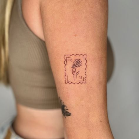 Forever Stamp Tattoo, Iris Stamp Tattoo, Ga Peach Tattoo, Tattoos In Frames, Picture Frame Tattoo Ideas, Square Tattoo Placement, Postcard Tattoo Ideas, Inside Upper Arm Tattoos For Women, Frame Tattoo Design Square