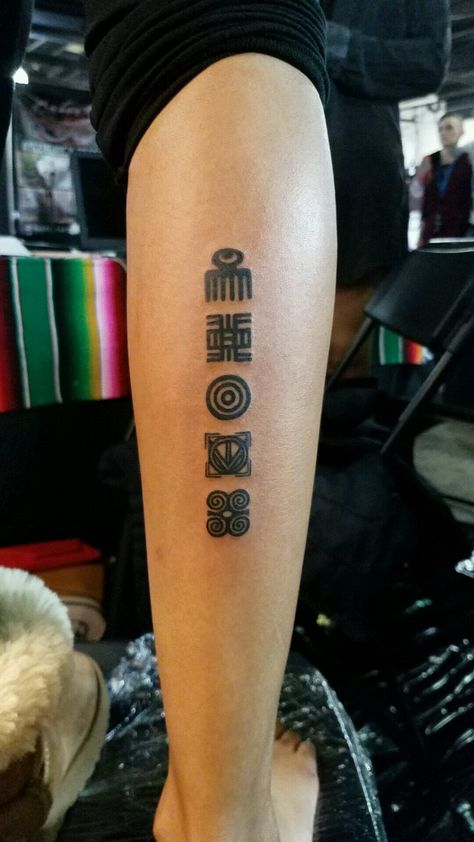 Adinkra symbols tattoo on back of calf... Adrinka Symbols Tattoos, Adrinka Symbol Tattoo, Ghanaian Tattoo, Swahili Symbols, Adinkra Symbols Tattoos, African Spirituality Tattoo, African Symbol Tattoo, Nigerian Tattoo Ideas, Ghana Tattoo