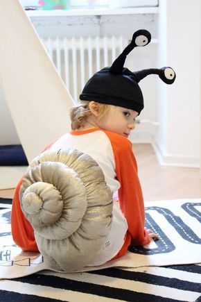 snail costume for your school play! Out of the Ark music, primary school songs, school musical, preschool songs, teachers, classroom resources, school songs, primary school musicals, Croak! Diy Safari Animal Costume, Diy Snail Shell Costume, Diy Snail Costume Kids, Diy Baby Snail Costume, Science Costumes For Kids, Snail Costume Diy, Diy Snail Costume, Snail Costume, Bug Costume