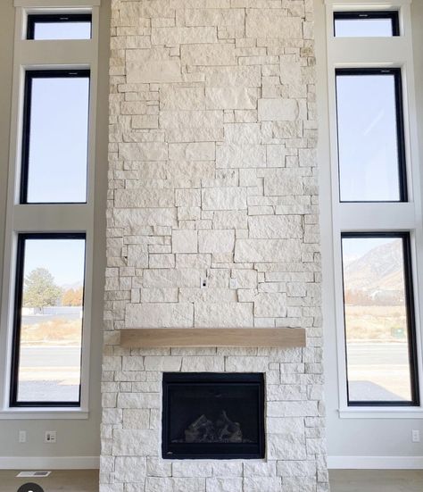 Fireplace Flush With Wall Stone, Stone Fireplace Without Mantle, Cream Stone Fireplace Living Room, White Stack Stone Fireplace, Partial Stone Fireplace, Dry Stack Fireplace, Tiled Fireplace With Wood Mantle, White Fireplace Stone, Herringbone Fireplace Wall