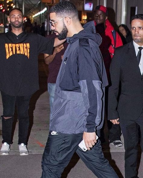 look alive 😍👀 Windbreaker Outfit Mens, Track Suit Men Nike, Drake Staying Alive, Drake Streetwear, Drake's Lookbook, Nike Windbreaker Outfit, Drakes Menswear, Drake Take Care Album, Drake Fashion