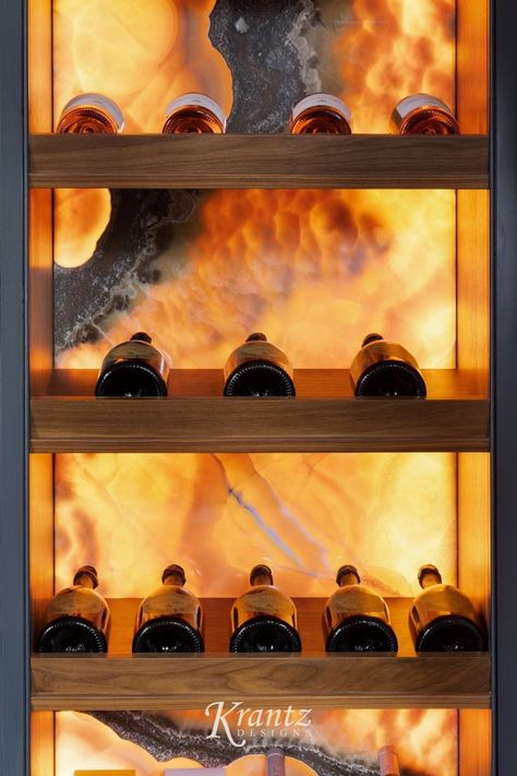 Back-lit onyx adds that warm, fiery glow and makes your wine shelving even more elevated. Onyx Bar Design, Country Kitchen Aesthetic, Wine Bar Aesthetic, Antique Mirror Splashback, Onyx Bar, Stone Bar, Bespoke Kitchen, Kitchen Aesthetic, Castle Hill