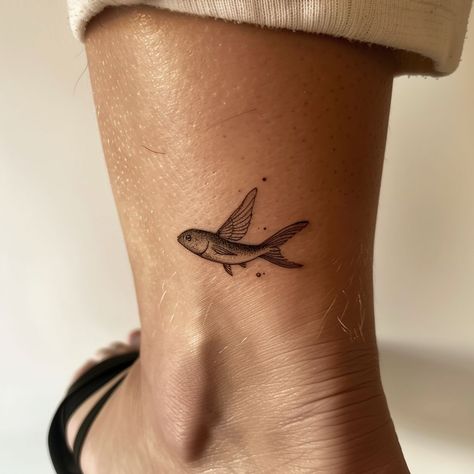 Flying Fish tattoo ideas. Check my page for more tattoo ideas. . . . . . . . . . .#flyingfish #flyingfishtattoo #tattoosymbolism #tattoomeaning #tattoodesignmeaning #tattooideas #tattoodesignidea #tattoodesigns Flying Fish Tattoo Design, Bird And Fish Tattoo, 2 Fish Tattoo, Little Fish Tattoo, Flying Fish Tattoo, Cute Fish Tattoo, Fish Tattoo Women, Reading Tattoo, Cute Fish