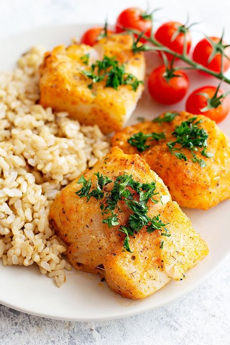 This is the best oven baked parmesan cod recipe! Tender cod fillets are coated with a delicious parmesan and spice mixture and are baked to perfection. This whole dish takes less than 30 minutes to make and is a healthy dinner with so much flavor. #codrecipe #mediterraneanfood #easydinner #seafoodrecipe #bakedcod Parmesan Crusted Cod, Cod Fillets, Baked Cod Recipes, Cod Fish Recipes, Cod Recipe, Lunch Restaurant, Mediterranean Spices, Easy Seafood, Cod Recipes