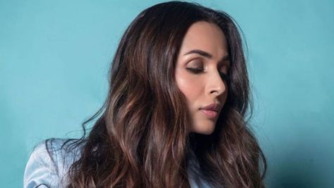 Malaika Arora's Homemade Hair Oil Recipe for Thick and Shiny Hair | VOGUE India | Vogue India Castor Oil And Coconut Oil, Thick Shiny Hair, Best Hair Oils, Homemade Hair Oil, Hair Oil Recipe, Wellness Hacks, Amla Hair Oil, Get Thick, Ayurvedic Hair Oil