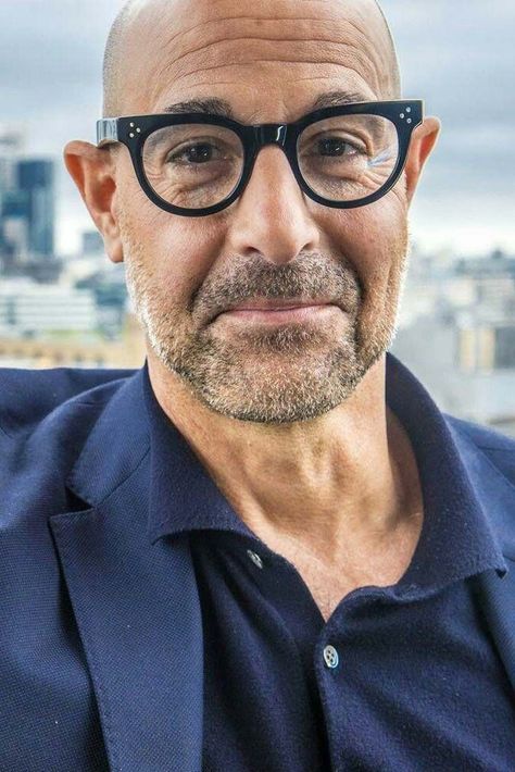 Stanley Tucci wearing thick rimmed vintage glasses frame