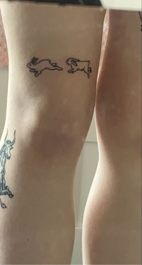 bunny rabbit tattoo jumping cute simple linework Rabbits Jumping Tattoo, Jumping Bunnies Tattoo, Cool Rabbit Tattoo, Bunny Running Tattoo, Dainty Rabbit Tattoo, Rabbit Leaping Tattoo, Above The Knee Tattoo Ideas Simple, 2 Bunny Tattoo, Rabbit Stick And Poke