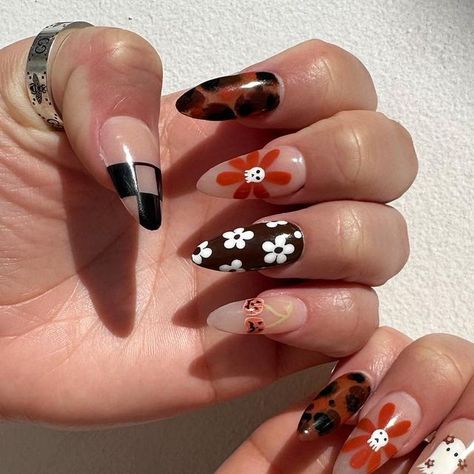 Nadia OrNAILas🔥 Oceanside CA NAILTECH on Instagram: "🤎🤍✨🧡🎃  Almond nails, size 4, brown, fall, flowers, pumpkin, skulls   #halloweennails #fall #fallnails #almondnails #nudenails #halloween #nailsofinstagram #elpaso #nails #kyliejenner #selenagomez" Skull Flower Nails, Nails Size, Pumpkin Nails, Brown Fall, Flower Skull, Nails Inspo, Flower Nails, Fall Flowers, Nails Design