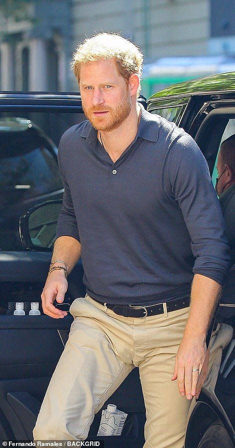 Harry and Meghan leave Carlyle Hotel for day two of their three-day New York City tour  | Daily Mail Online Harlem Restaurants, Mahalia Jackson, Prince Harry Photos, Prinz Harry, Navy Polo Shirt, Beige Chinos, Principe Harry, Poses For Photos, Prince Harry And Meghan