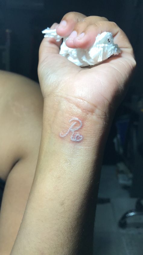 White tattoo letter R J And R Tattoo, R Tattoo Letter Initial, Letter R Tattoo Ideas, R Letter Tattoo Design, R Tattoo Letter, Letter R Tattoo, R Letter Design, Ganpati Songs, Z Tattoo