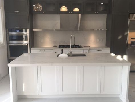 Calacatta Nuvo Caesarstone, Caesarstone Calacatta Nuvo, Apartment Kitchen Island, Exterior Paint Colours, Kitchen Island With Cooktop, Kitchen Island With Drawers, Concrete Kitchen Island, Caesarstone Kitchen, Curved Kitchen Island