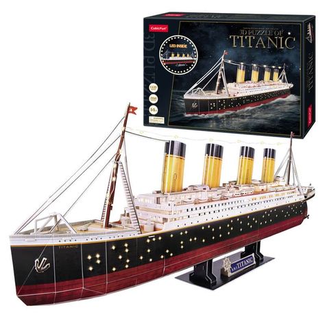 Edad: +14 años. Maqueta a escala con luces LED del famoso RMS Titanic. El Titanic fue un transatlántico británico (el mayor barco de pasajeros del mundo en ese momento). Se hundió en abril de 1912 durante su viaje inaugural, de Southampton a Nueva York.49.95 en nuestra tienda de IMPORTACIONES Ver mÃ¡s cosas que comprar en https://www.espadasymas.com/importaciones/juegos-juguetes/puzzle-3d-titanic-led-266pzs/ Queen Anne’s Revenge, Darth Vader Helm, Lego Darth Vader, Titanic Model, Pirate Ship Model, 3d Jigsaw Puzzles, Titanic Ship, Arts And Crafts For Adults, Family Puzzles