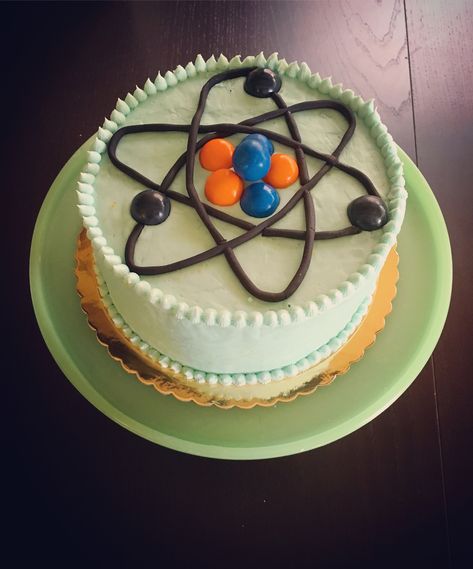 Atom cake Physics Birthday Cake Ideas, Physics Cake, Physics Cake Ideas, Chemistry Cake, Eggless Vanilla Cake Recipe, Science Cake, Mad Scientist Birthday, Scientist Birthday Party, Scientist Birthday