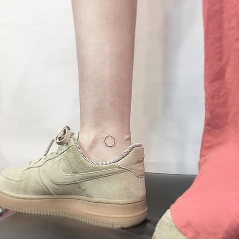 Minimalist circle tattoo on the ankle. Circle Ankle Tattoo, Minimalist Circle Tattoo, Circle Tattoo Placement, Small Circle Tattoo, Circle Tattoo Design, Circular Tattoo, Circle Designs, Ankle Tattoo Designs, Circle Tattoos