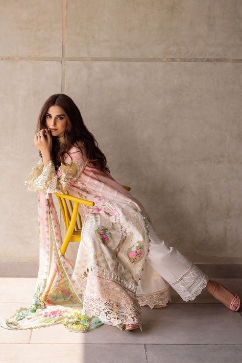 Brand: Saira RizwanProduct Code: SRLL24-01 LAURELCollection: Saira Rizwan Unstitched Luxury Lawn Summer CollectionFabric: Lawn DESIGN DETAILS: Ombre Embroidered and Laser cut Front Center Panel (Lawn + Organza) 1-PC Embroidered Side Panels with Laser Cut (Lawn + Organza) 2-PC Ombre Embroidered Back (Lawn) 1 Yard Dyed Plain Sleeves (Lawn) 0.75 Yard Digital Printed Dupatta (Chiffon) 2.75 Yards Dyed Trouser (Cambric) 2 Yards Accessories: Embroidered Patch for Sleeves (Organza) 2-PC Embroidered Border for Sleeves (Organza) 1.25 Yards Embroidered Border for Front and Back (Organza) 2 Yards Embroidered Front Border (Organza) 3 Yards Lace for Shirt Hem (1 Yard) DISCLAIMER:* Lining, Laces, and Tassels are not included in unstitched variants.* Embellishment items in stitched outfits are subject to Luxury Organza Dress With Digital Print, Luxury Designer Lawn Suit With Self Design, Luxury Unstitched Lawn Suit, Luxury Festive Lawn Suit In Organza, Luxury Printed Dupatta, Luxury Long Sleeve Lawn Suit In Organza, Luxury Festive Organza Lawn Suit, Luxury Women's Unstitched Summer Suit, Luxury Elegant Lawn Suit In Organza