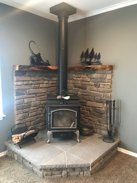 Corner wood stove fireplace with juniper mantel Wood Stove Decor, Wood Burning Stove Corner, Corner Wood Stove, Wood Stove Surround, Wood Stove Wall, Woodburning Stove Fireplace, Corner Stove, Stove Decor, Wood Stove Hearth