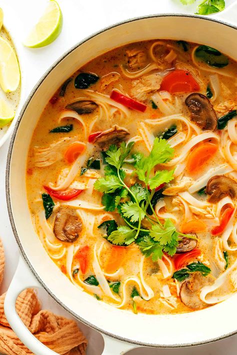 This Thai-inspired chicken noodle soup recipe is quick and easy to make, naturally gluten-free, always tastes so fresh and flavorful! Use whatever protein (chicken, beef, pork, shrimp, tofu, chickpeas), veggies, greens, and noodles you happen to have on hand, simmer everything together in a ginger coconut curry broth, top with fresh herbs and lime and dinner is ready to go! | gimmesomeoven.com Thai Chicken Noodle Soup, Shrimp Tofu, Thai Soup Recipes, Curry Broth, Thai Chicken Noodles, Thai Chicken Soup, Chicken Noodle Soup Recipe, Thai Curry Paste, Thai Soup