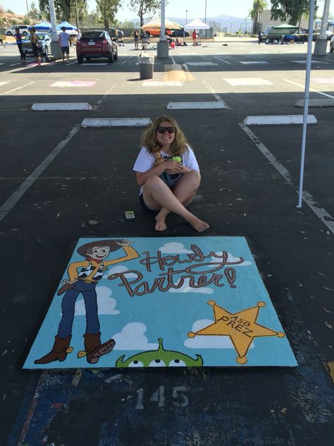 Emma's Senior Parking Spot at CHS Woody Toy Story Alien Class of Toy Story Senior Parking Spots, Snoopy Senior Parking Spot, Disney Themed Senior Parking Spots, Senior Parking Spaces Disney, Up Senior Parking Spot, Senior Parking Spot Painting, Senior Sports Photography, Senior Parking Spot, Parking Lot Painting