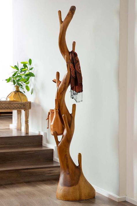 This cool new Twisted Suar Wood Coat Rack is a sculptural coat tree hand-carved by artisans in Indonesia from a single Suar wood log that has 10 natural branch hooks to hold jackets, hats, scarves, bags, and more. Wood Coat Rack, Tree Coat Rack, Natural Branches, Coat Tree, Organic Furniture, Hats And Scarves, Wooden Coat Rack, Standing Coat Rack, Tree Carving