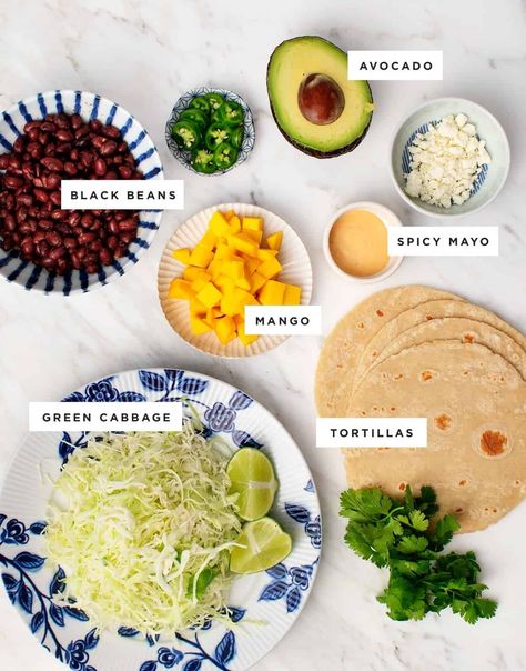 Spicy Mango, Black Bean & Avocado Tacos are a sweet, simple, and spicy weeknight dinner! Vegetarian with a vegan option. | Love and Lemons #mealprep #tacos #mango Mango Tacos, Avocado Tacos, Avocado Taco, Spicy Tacos, Recipes Gluten Free, Vegetarian Tacos, Bean Tacos, Light Side, Avocado Recipes