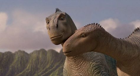 Following the success of films like Jurassic Park, Disney soon created its own movie about dinosaurs.  Dinosaur (2000) is about a group of dinosaurs, and lemurs, who are on a desperate search to find a new home.  The film was very successful, and eventually inspired a ride by the same name at Disney's Animal Kingdom.  Seen here are Aladar and Neera, two of the main characters. Disney Dinosaur Movie, Dinosaur 2000, Disney Dinosaur, Dinosaur Movie, The Possession, All Dinosaurs, Disney Zootopia, Disney Animated Movies, Disney Collage