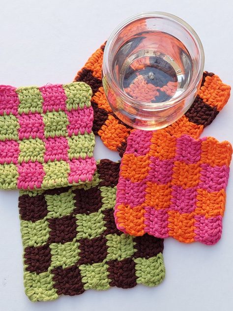 Crochet cotton checkered coasters Trendy Crochet Coasters, Checkered Coaster Crochet, Crochet Projects Coasters, Checker Coasters, Checkerboard Granny Square, Crochet Checkered Blanket, Checkered Crochet Blanket, Checkered Crochet Pattern, Checkered Ideas