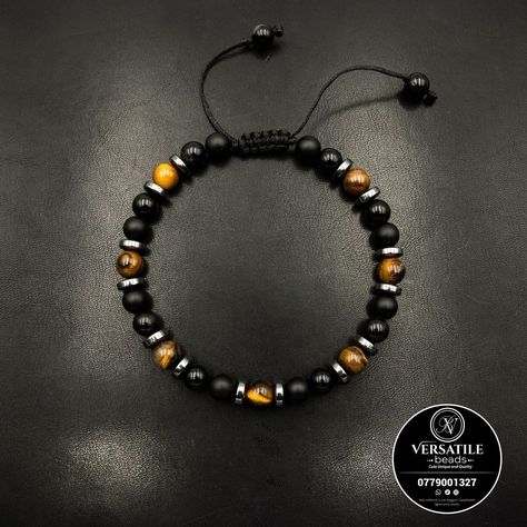 Bracelet for men: Black Onyx, Matte black and rigers eye with hermatite discs Whatsapp 0779001327 to place in your ordee💯🫶 Paracord Bracelet Patterns, Pretty Jewelry Necklaces, Wood Bead Bracelet, Tiger Eye Crystal, Diy For Men, Beads Bracelet Design, Tiger Eye Bracelet, Skull Bracelet, Diy Crystals