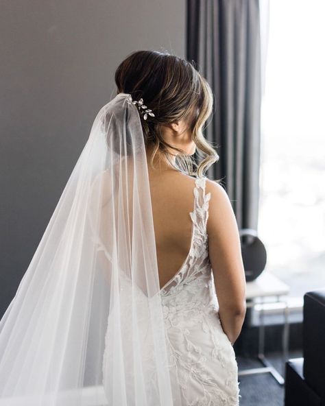 Spring Wedding Hairstyles 2024 Looks [Guide & FAQs] Wedding Hairstyles With Veil Underneath, Sleek Wedding Updo With Veil, Wedding Hair Low Updo With Veil, Low Bun Wedding Hair Veil, Veil Above Bun, Wedding Hairstyle Bun With Veil, Loose Bridal Updo With Veil, Bride Hair Bun With Veil, Low Wedding Updo With Veil