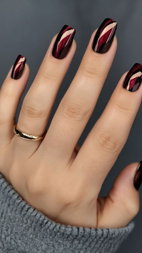 Get ready to embrace the season with stunning red fall nails that are perfect for any occasion Our latest blog post explores a variety of dark reds and vibrant shades offering design ideas that will make your nails stand out Discover creative acrylic designs featuring short nail art that combines red with striking black accents Whether you're looking for elegant inspirations or bold statements we've got you covered with color combinations that capture the essence of fall Tran Maroon Nails With Black Tips, Black With Red Chrome Nails, Red And Black Fall Nails, Black And Maroon Nail Designs, Black Nails With One Accent Nail, Vamp Red Nails, Burgundy Gel Nails Short, Black Nails With Red Chrome, Black Red Nails Ideas