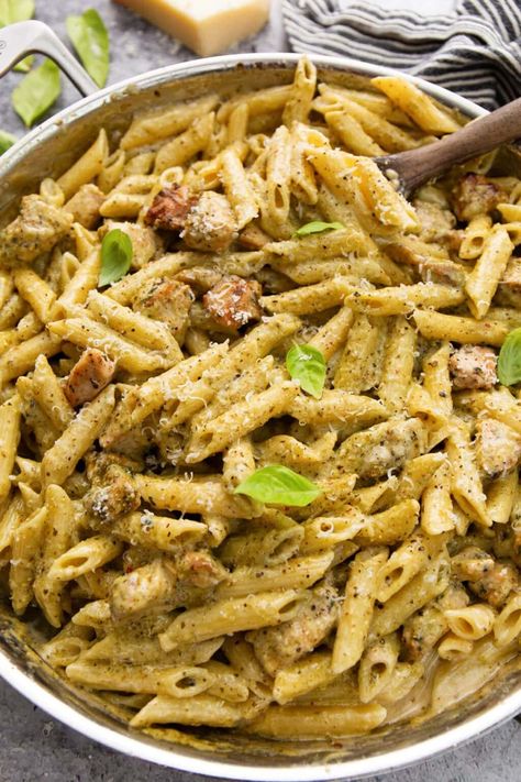 Creamy pesto chicken pasta pairs your favorite pasta with a rich and cheesy sauce bursting with the fresh flavors of garlic and basil pesto. Creamy Pesto Chicken, Pesto Pasta Recipes Chicken, Pasta With Green Beans, Creamy Pesto Chicken Pasta, Basil Pesto Pasta, Creamy Pesto Pasta, Chicken With Italian Seasoning, Pesto Pasta Recipes, Italian Menu