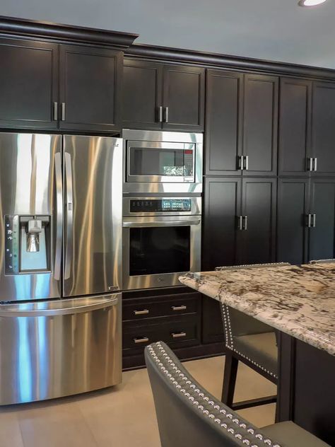 Kitchen Color Schemes That Complement Stainless Steel Appliances – Forbes Home Cabinets With Stainless Steel Appliances, Textured Tile Backsplash, Tennessee Homes For Sale, Black Stainless Steel Appliances, Tennessee Homes, Kitchen Color Schemes, Grey Kitchen Walls, Kitchen And Laundry Room, Light Grey Kitchens