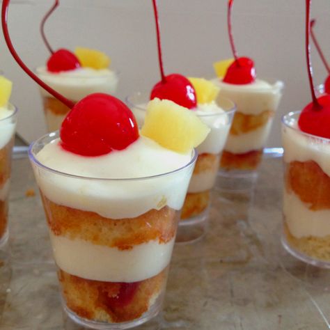 Pineapple Upside Down Cake Shooters with Pineapple Cream Cheese Frosting Pineapple Upside Down Dessert Shooters, Birthday Charts Childcare, Desert Shooters, Pineapple Cream Cheese Frosting, Shooters Recipes, Upside Down Desserts, Cup Desserts, Cake Shooters, Dessert Shooters Recipes