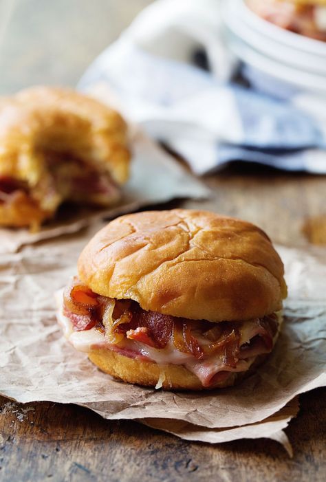 Hot Ham and Cheese with Bacon and Caramelized Onions -  seriously so good. These little oven baked sandwiches are ready in 20 minutes! | pin... Hot Ham And Cheese, Ham And Cheese Sandwiches, Resep Sandwich, Baked Sandwiches, Roast Beef Sandwich, Ham And Cheese Sandwich, Burgers Sandwiches, Cheese Sandwich, Chapati