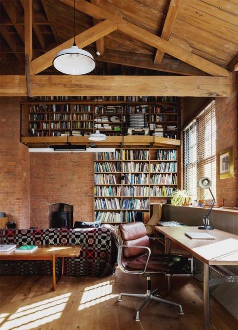 Ten residential interiors with spacious open-plan studies Oak Bookshelves, Warehouse Conversion, Minimalist Home Office, Berlin Apartment, Exposed Brick Walls, London Apartment, Home Libraries, Loft Apartment, Wet Rooms