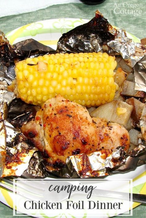 Easy Camping Chicken Foil Dinner makes camp meals a breeze. Prep the packets of chicken, potatoes, and corn at home, prepare a fire in the grate at the campsite and a complete dinner is done by the time you've set up camp! #camping #campfood #grilling Camp Meals, Campfire Breakfast, Foil Pack Dinners, Foil Dinners, Foil Pack Meals, Camping Breakfast, Foil Packet Meals, Camping Dinners, Easy Camping Meals