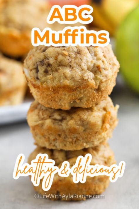 pile of ABC muffins with writing Apple Carrot Recipes Healthy, Apple Carrot Recipes, Carrot And Apple Recipes, Healthy Apple Banana Muffins, Easy Breakfast Muffins For Kids, Apple Banana Carrot Muffins, Toddler Apple Muffins, Abc Muffins Toddler, Oatmeal Carrot Apple Muffins