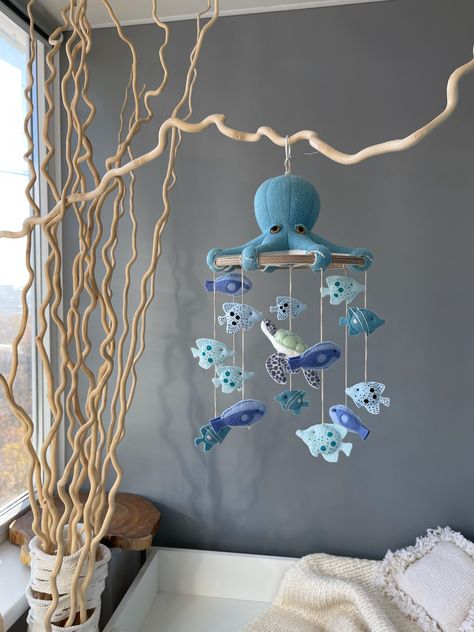 "♡ This mobile is specially designed for the nautical themed nursery decor . The octopus makes the mobile special. The little fishes are painted with acrylic paint by hand. This is my author's design. You will not find this design in any other store. You may be sure it would be a perfect gift for new mother and her baby. And It is a wonderful decor for nursery as well. ♡ This is a handmade mobile . I do each seam with my own hands! I don't use a sewing machine. I design and draw all templates fo Baby Room Ocean Theme, Cute Baby Nursery Ideas, Octopus Nursery, Nautical Mobile, Fish Mobile, Hanging Crib, Handmade Mobile, Mobile Hanger, Mobile Hanging