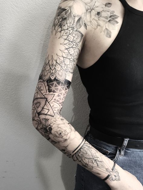 #flowers #flowertattoo #geometrictattoo #geometry #sleeve #fineline #finelinetattoo #girl #girlytattoo #blackwork #dotworktattoo | By Dorota Masalska | Done at XY Studio | Aug 27th 2019 | 1154709 Arm Sleeve Tattoos For Women, Mandala Tattoo Sleeve, Geometric Sleeve Tattoo, Petit Tattoo, Skull Sleeve Tattoos, The Trend Spotter, Boho Tattoos, Dot Tattoos, Tattoos For Women Half Sleeve