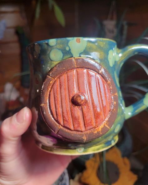 All Hobbit door mugs are up!!! Snag your fav on the website!!! 😍 Hobbit Pottery, Lotr Ceramic, Ceramic Hobbit House, Hobbit Mug, Polymer Clay Hobbit Door, Hobbit Door, Hobbit Hole, Pottery Pitcher, Lord Of The Rings