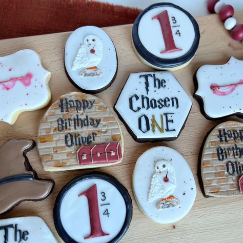 Harry Potter cookies Harry Potter Cookies 1st Birthday, Harry Potter Chosen One Cookies, The Chosen One First Birthday Photoshoot, Harry Potter First Birthday Cookies, The Chosen 1 First Birthday, Harry Potter 1 Year Birthday, Harry Potter 1st Birthday Party Ideas, Diy Harry Potter First Birthday, Harry Potter First Birthday Party Ideas