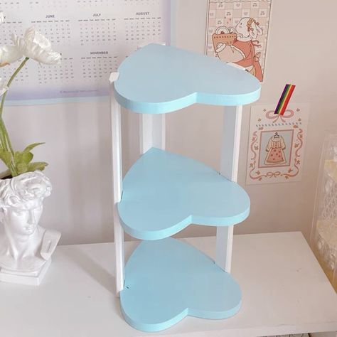 This 3-layer kawaii shelf is ideal for organising cosmetics, student dormitory items, and displaying belongings. Its love heart shape shelves makes it perfect for any girl's bedroom or desktop. Material: Wood Kawaii Room Accessories, Heart Shape Shelf, Heart Bedroom Decor, Heart Shaped Shelf, Heart Shaped Furniture, Kawaii Nightstand, Cute Cheap Room Decor, Cute Furniture For Bedroom, Girls Bedroom Shelf