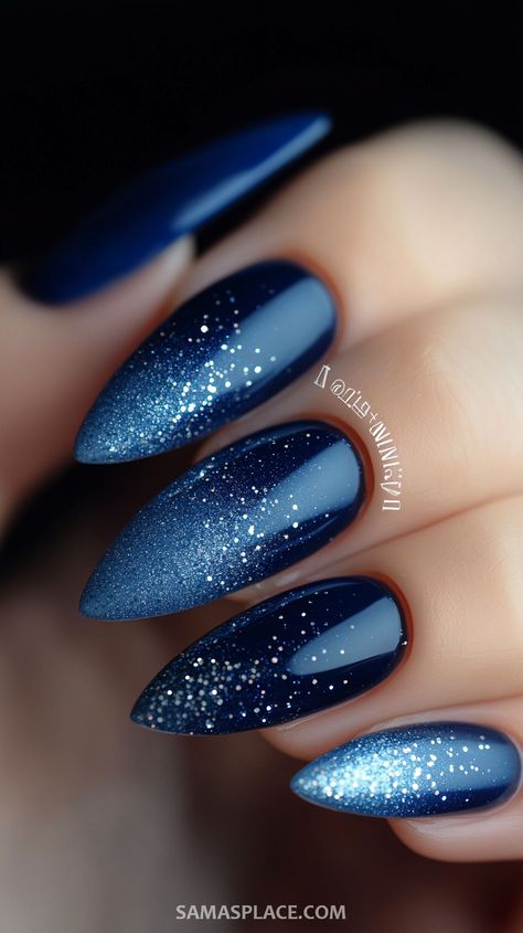 Bring a cool and festive vibe to your holiday style with 21+ blue Christmas nail ideas. From icy blue tones with shimmering silver accents to deep navy designs adorned with snowflakes and stars, these nails are perfect for winter celebrations. Try elegant ombré effects, glittery tips, or frosty patterns to capture the magic of the season. #BlueChristmasNails #HolidayNailInspo #FestiveNailArt2024 Christmas Nails Blue Glitter, Teal New Years Nails, Blue New Years Eve Nails, Dark January Nails, Blue And Silver Nails Almond, Blue And Silver Ombre Nails, Christmas Nail Blue, Blue White Gold Nails, Christmas Nails Dark Blue