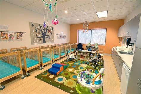 best infant daycare rooms in 2023 Daycare Room Paint Colors, Daycare Nursery Decor, Infant Classroom Design, Infant Area Home Daycare, Infant Center Classroom, Infant Room Design, Daycare Foyer Ideas, Infant Classroom Setup, Infant Day Care Room Ideas