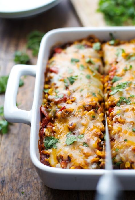 Healthy Mexican Casserole with Roasted Corn and Peppers Recipe - Pinch of Yum Casserole Enchilada, Healthy Mexican Casserole, Vegetarian Casserole Recipes, Vegetarian Casserole, Frijoles Refritos, Vegetarian Gluten Free, Mexican Casserole, Healthy Mexican, Roasted Corn