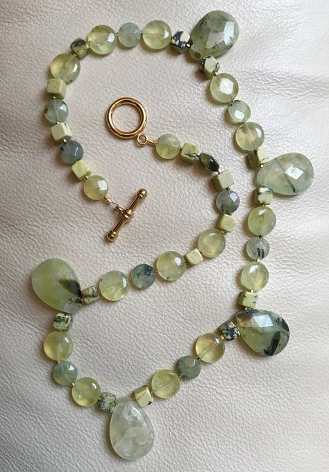 "Lemony yellow Prehnite!  Coupled with Yellow Turquoise & 24K Gold Seed Beads of this piece shows Etruscan influences w/ its rich, opulent & rhythmic qualities.  Prehnite has a luminous quality to it that I find magical and these large faceted stones really bring that quality to light. DIMENSIONS: Length = 20-1/2\" Teardrop Stones = 1\" x 35/8\" Width = 1/2\" PREHNITE Is said to be used to aid spirit communication through meditation and/or dream work, lucid dreaming.  It is also known as a stone Spirit Communication, Turquoise And Gold, Yellow Turquoise, Lucid Dreaming, Crazy Lace Agate, Rutilated Quartz, Gorgeous Design, Plexus Products, Precious Metals